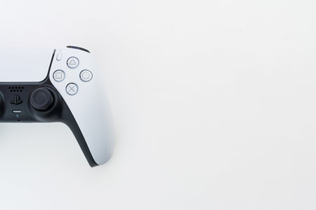 Playstation 5 Dual Sense controller isolated on white background. Selective focus. Rio de Janeiro, RJ, Brazil. September 2021.のeditorial素材