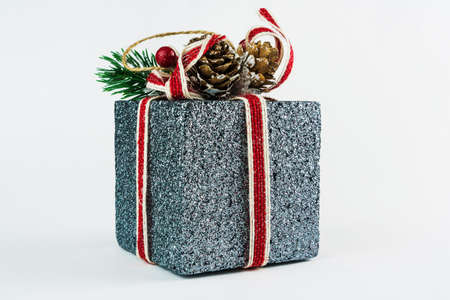 Gift box isolated on white background. Christmas ornament. Selective focus.の写真素材