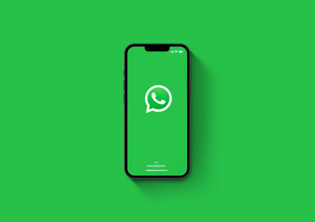 WhatsApp app on smartphone iPhone 13 Pro screen on green background. Rio de Janeiro, RJ, Brazil. October 2021.のeditorial素材