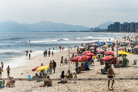 Barra da Tijuca beach, Rio de Janeiro, Brazil. Day with blue sky and some clouds. Rio de Janeiro, Brazil. November 2021.のeditorial素材
