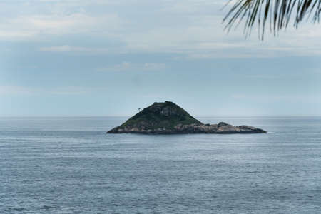 Tijuca Islands in the background, seen from Joatinga beach, Rio de Janeiro, Brazil. Day with blue...
