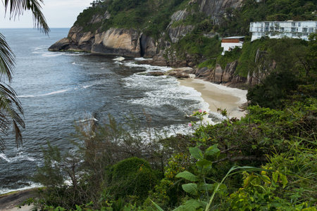 View of Joatinga Beach, Rio de Janeiro, Brazil. Day with blue sky and some clouds.のeditorial素材