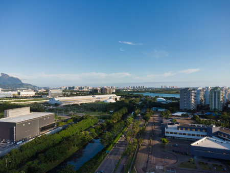Aerial view of JacarÃ©pagua in Rio de Janeiro, Brazil. Residential buildings and mountains in the background. Sunny day. Sunset Drone photo.の写真素材