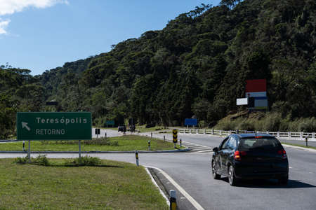Road to TeresÃ³polis, Rio de Janeiro, Brazil. Mountain region of the state. Signposts, cars on the...