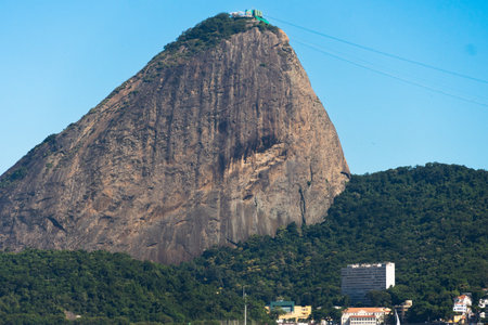 Guanabara Bay in Rio de Janeiro, Brazil with Sugarloaf Mountain in the background. Beautiful landscape and hill with the sea. Sunny summer day.の写真素材