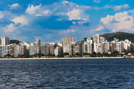 Guanabara Bay in Rio de Janeiro, Brazil with a hill in the background. Beautiful landscape and hill with the sea. Sailing boats in the bay. IcaraÃ­ beach, NiterÃ³i in the background.の写真素材