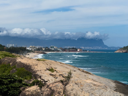 Macumba Beach and Recreio dos Bandeirantes in Rio de Janeiro, Brazil. Pedra do Pontal and Pedra da...