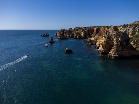 Praia de Dona Ana beach near Lagos town, Algarve, Portugal. Praia Dona Ana beach with turquoise sea...