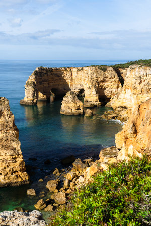 Marina Beach (Praia da Marinha) in Lagos, Algarve, Portugal. Algarve beaches are a touristic paradise. Sunny dayの写真素材