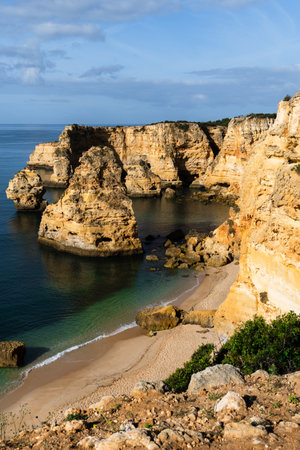 Marina Beach (Praia da Marinha) in Lagos, Algarve, Portugal. Algarve beaches are a touristic paradise. Sunny dayの写真素材