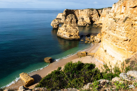 Marina Beach (Praia da Marinha) in Lagos, Algarve, Portugal. Algarve beaches are a touristic paradise. Sunny dayの写真素材