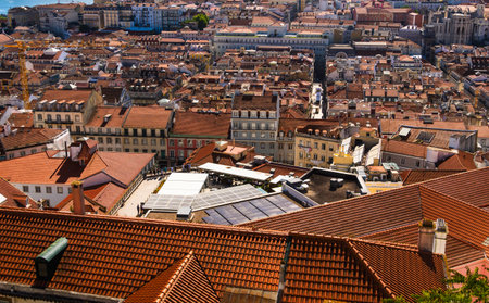 Aerial view of historical houses with red and colored roofs, Lisbon, Portugal. Urban Cityscape...