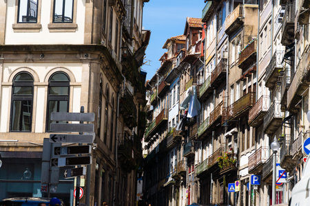 View of the city of Porto. Characteristic architecture of Porto, Vila Nova de Gaia, Portugal. Urban landscape along the river. Houses and buildings.の写真素材