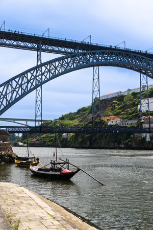 View of Porto city and Douro river and Dom Luis bridge. Porto, Vila Nova de Gaia, Portugal. Cityscape along the river.の写真素材