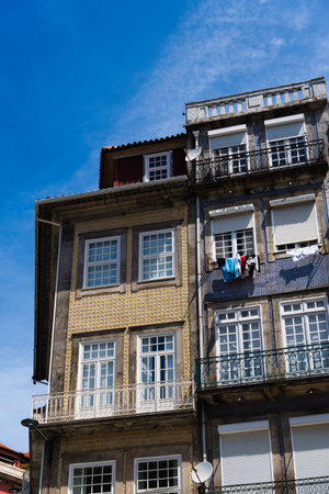 View of the city of Porto. Characteristic architecture of Porto, Vila Nova de Gaia, Portugal. Urban landscape along the river. Houses and buildings.の写真素材
