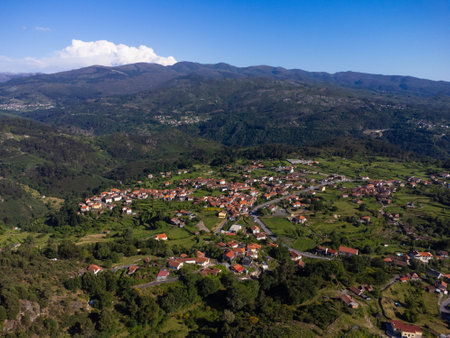 Beautiful and scenic aerial view of village of GerÃªs, Soajo, Portugal. Spring day. City, houses, mountains and waterfalls. Near Porto. droneの写真素材