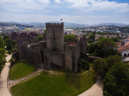 Aerial view of Guimaraes city, Castelo Guimaraes Castle and PaÃ§o dos Duques. Cityscape seen from the air. Portugal. Drone.の写真素材