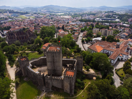 Aerial view of Guimaraes city, Castelo Guimaraes Castle and PaÃ§o dos Duques. Cityscape seen from the air. Portugal. Drone.の写真素材