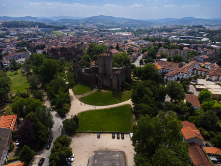 Aerial view of Guimaraes city, Castelo Guimaraes Castle and PaÃ§o dos Duques. Cityscape seen from the air. Portugal. Drone.の写真素材