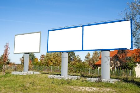Three blank advertising billboards on the residential areaの写真素材
