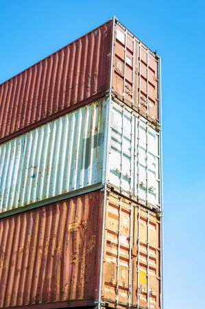 Closeup of stacked shipping containtersの写真素材