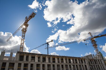 Closeup of cranes on a construction site