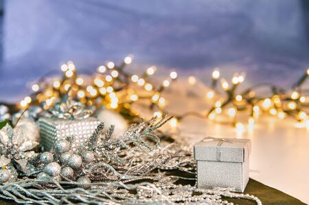 Close-up of gift box and Christmas decorations