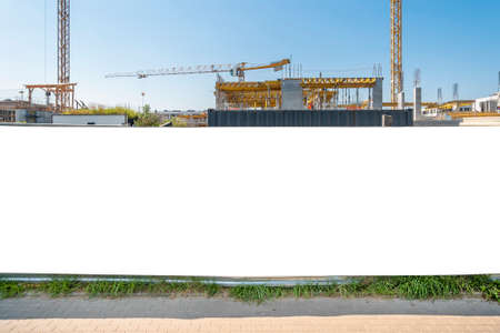 Advertising banner mock-up on the construction site fence