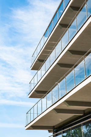 Modern luxury apartment building with big terraces