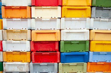 Colorful plastic fish crates in harborの写真素材