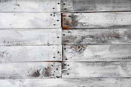 Wall made with old white painted wooden planksの写真素材