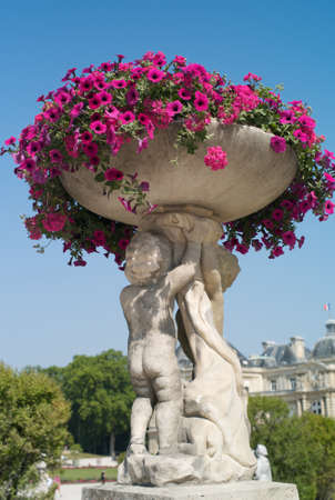 Beautiful Old Flowerpot with Pink Flowersの写真素材