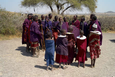 Serengeti, Tanzania - July 31 2008: Masai performing a ritual dance, holding spears, in the Serengeti, Tanzania.のeditorial素材