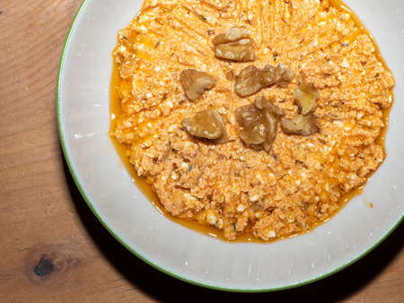 Turkish Meze Feta Sheep Cheese and Walnut Spread - Oriental Appetizer in a Bowl on a Wooden Table - Beyaz Peynir Ezmesiの写真素材