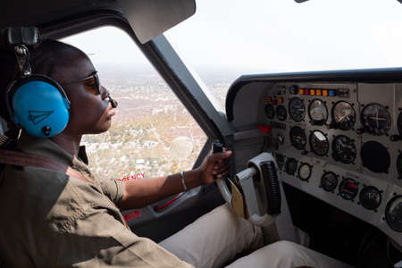 Maun, Botswana - August 4 2019: Young, African, Black, Female Bush Pilot Flying Kavango Air...