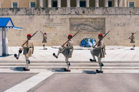 Athens, Greece - May 9 2015: Changing of the Guard at the Tomb of the Unkonwn Soldier at the Hellenic Parliament on Syntagma Square. Soldiers Marching on Parade.のeditorial素材