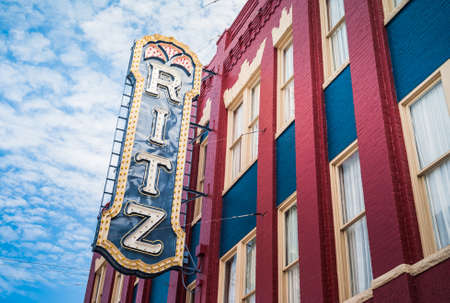 Brunswick, Georgia, United States - July 18 2012: Historic Ritz Theater Sign in Old Town Brunswick on a Red and Blue Brick Facade.のeditorial素材