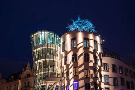 Prague, Czech Republic - July 10 2020: Dancing House Rooftop Terrace Detail Illuminated at Night, Called Tancici Dum in Czech in Prague, designed by Vlado Milunic and Frank Gehry.のeditorial素材