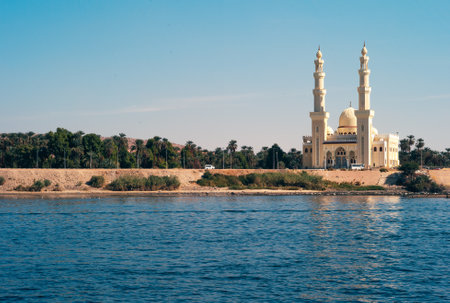 El Tabia Mosque with Minarets in Aswan, Egypt on the Bank of the River Nileの写真素材