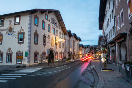 Golling, Austria - February 1 2021: Town in the Tennengau of Salzburg, Austria at Night, Markt Street at Dusk with Gasthof Goldene Traube Inn, Hotel and Restaurantのeditorial素材