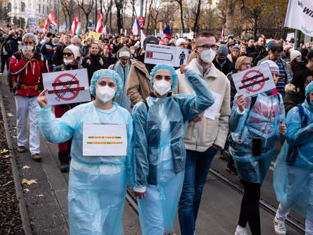 Vienna, Austria - November 20 2021: Anti-Vax Covid-19 Demonstrator Nurse or Health Care Worker.のeditorial素材