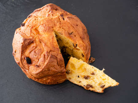 Panettone Italian Sponge Cake or Sweet Bread Panettone Italian Sponge Cake or Sweet Bread Slice from Milan, Served Traditionally for Christmas from Milan, Served Traditionally for Christmasの写真素材