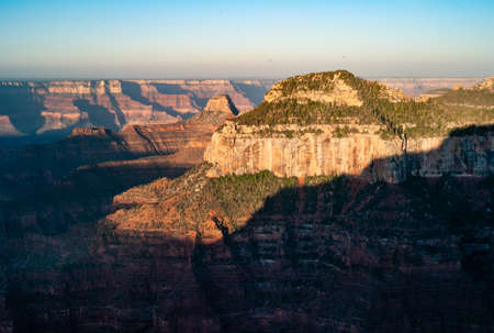 Sunrise at Oza Butte in the Grand Canyon from Bright Angel Point on the North Rim in Arizona, USAの写真素材