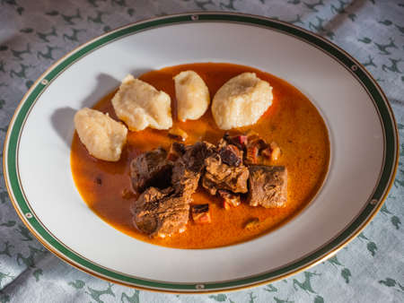 Venison Goulash Wild Game Hotpot with Dumplings with Paprika Gravy