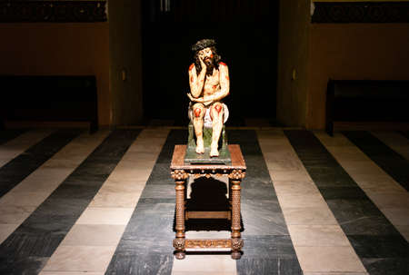 Lima, Peru - July 17 2010: Cristo de la Soledad de la Catedral de Lima Statue. A sculpture of Jesus Christ Seated in Solitude.のeditorial素材