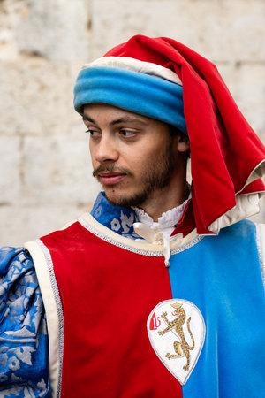 Siena, Tuscany, Italy - August 15 2022: Panther or Pantera Contrada Flag Bearer in Renaissance Historical Costume at the Palio di Sienaのeditorial素材
