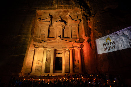 Petra, Jordan - October 27 2022: The Treasury or Al Khazneh Facade in Petra by Night illuminated by Candlesのeditorial素材