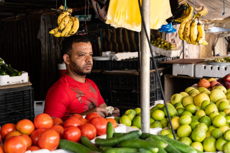 Dayr Allah, Jordan - October 25 2022: Fruit and Vegetable Vendor Selling Groceries in Market Stalls.のeditorial素材
