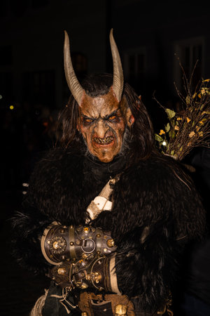Cesky Krumlov, Czech Republic - December 4 2022: Krampus or Cert Demonic Figure with Horned Mask in Czechia.のeditorial素材