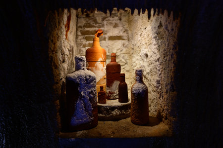 Petrified Bottles in the Underground of the Vrdlo Thermal Hot Spring in Karlovy Vary, Bohemia, Czech Republicの写真素材